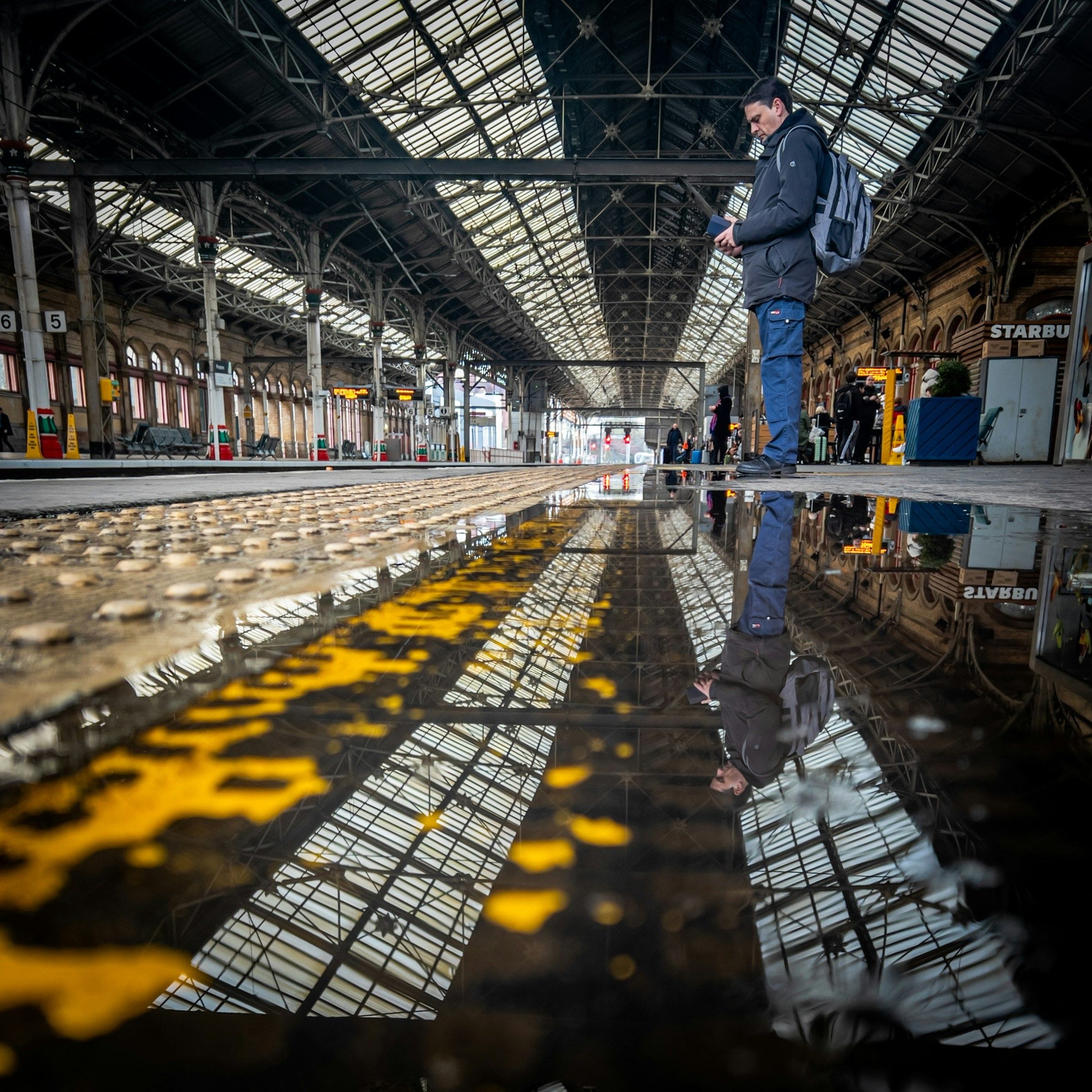 Preston railway station, its roof reflected on the platform