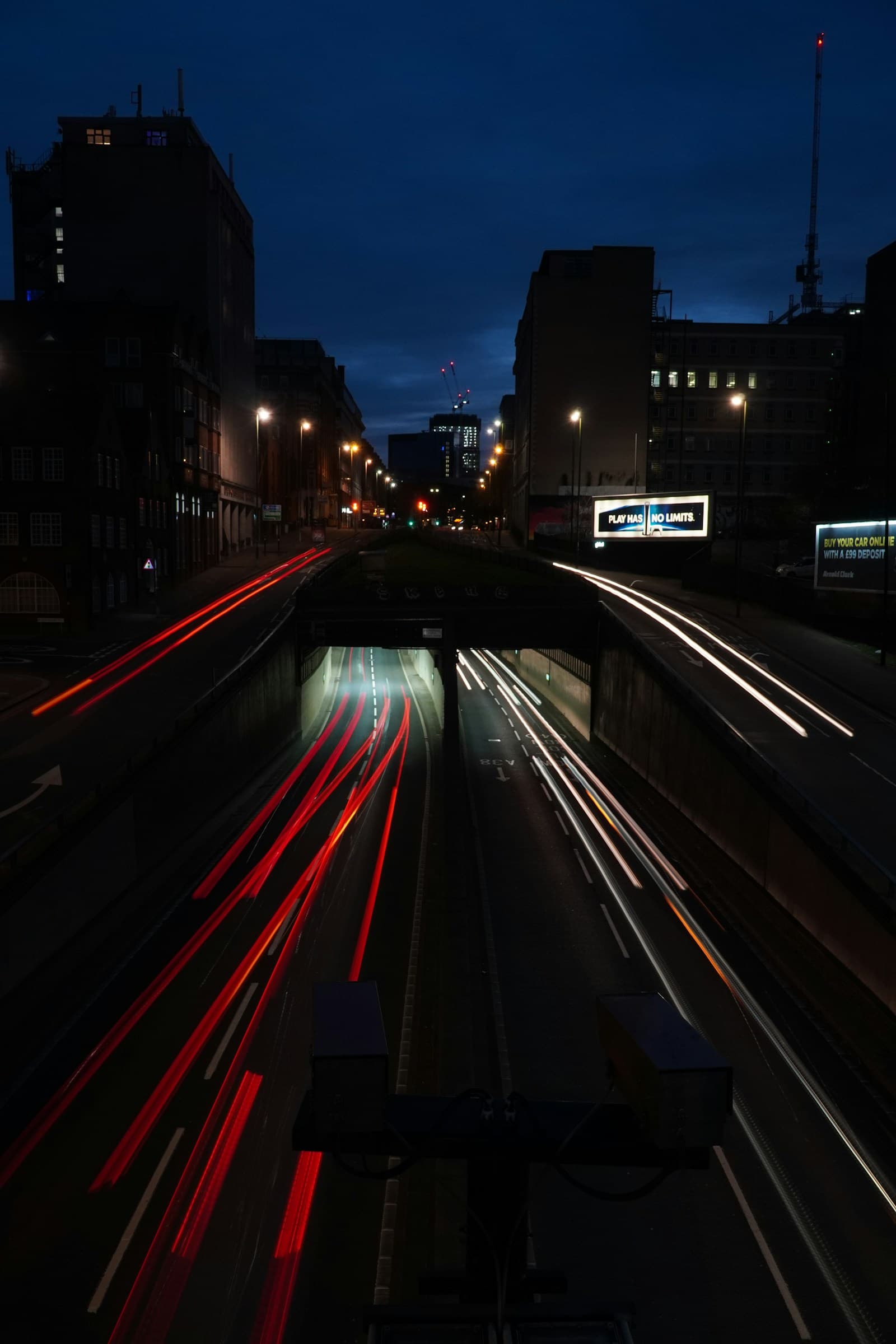 Light trails from traffic in a city at night