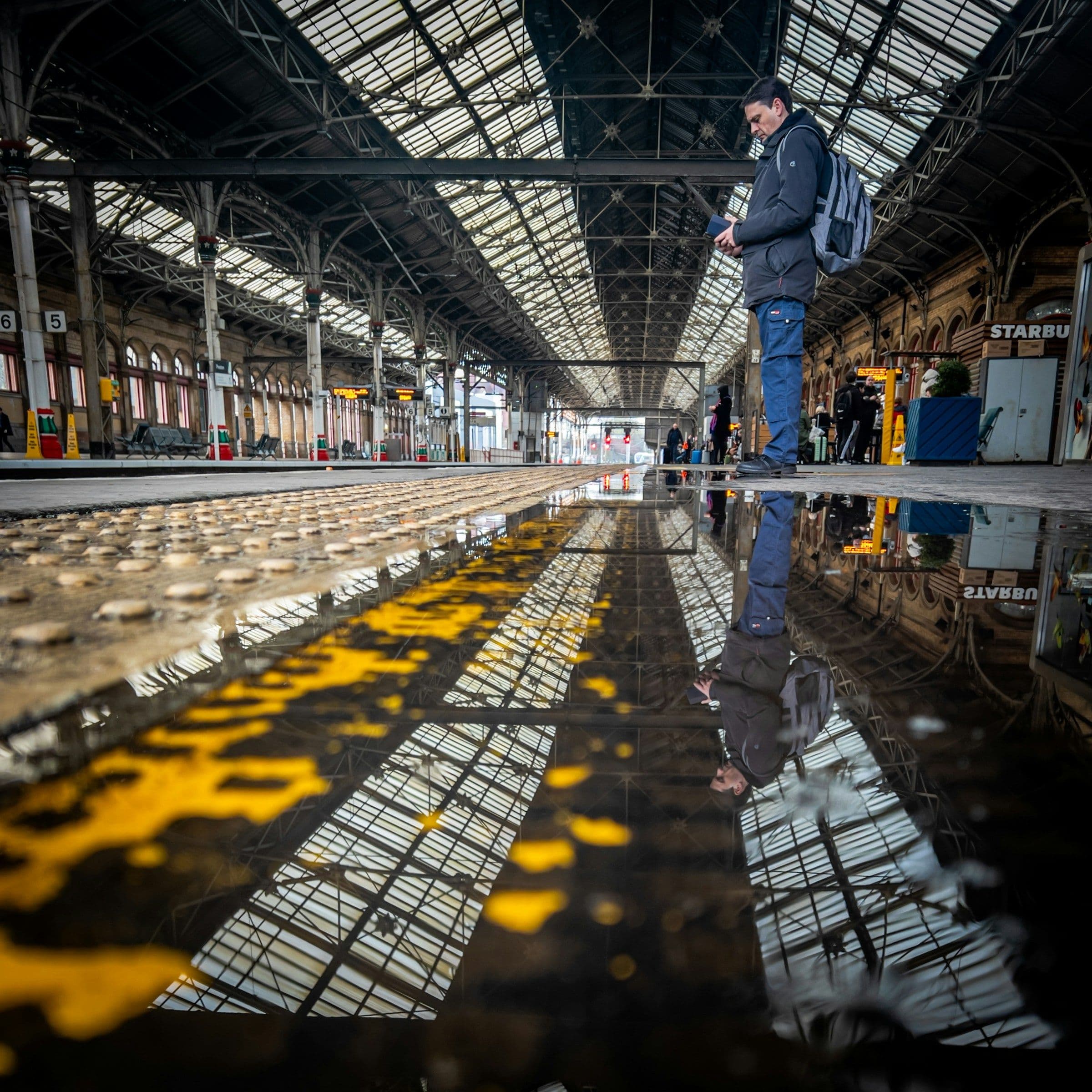 Preston railway station, its roof reflected on the platform